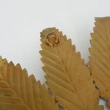 Old sun mirror with foliage in gilded metal with twisted frieze from the 60s