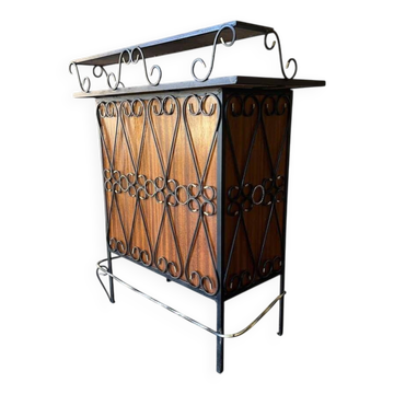 Vintage wooden bar counter with ceramic accents.