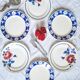 Old mismatched flat plates in earthenware