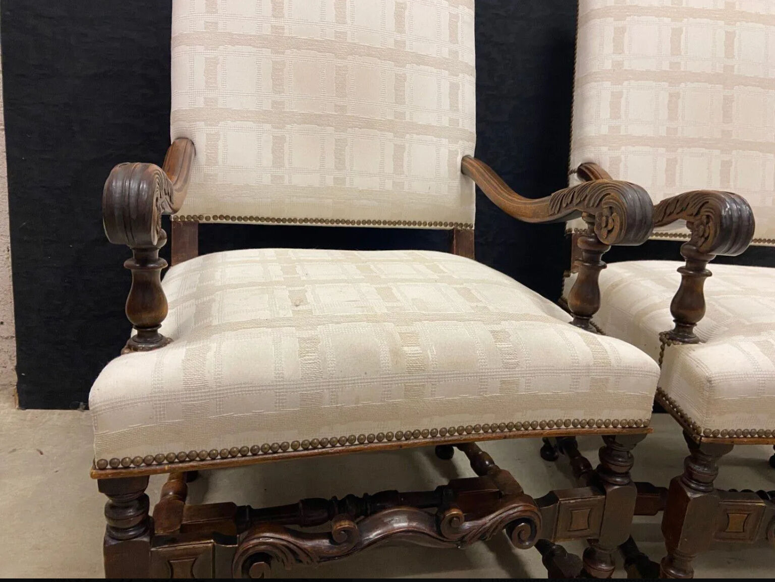 Pair of Louis XIII style molded wood armchairs