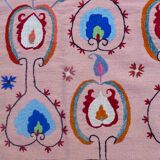 Salmon pink suzani kilim rug with embroidered patterns