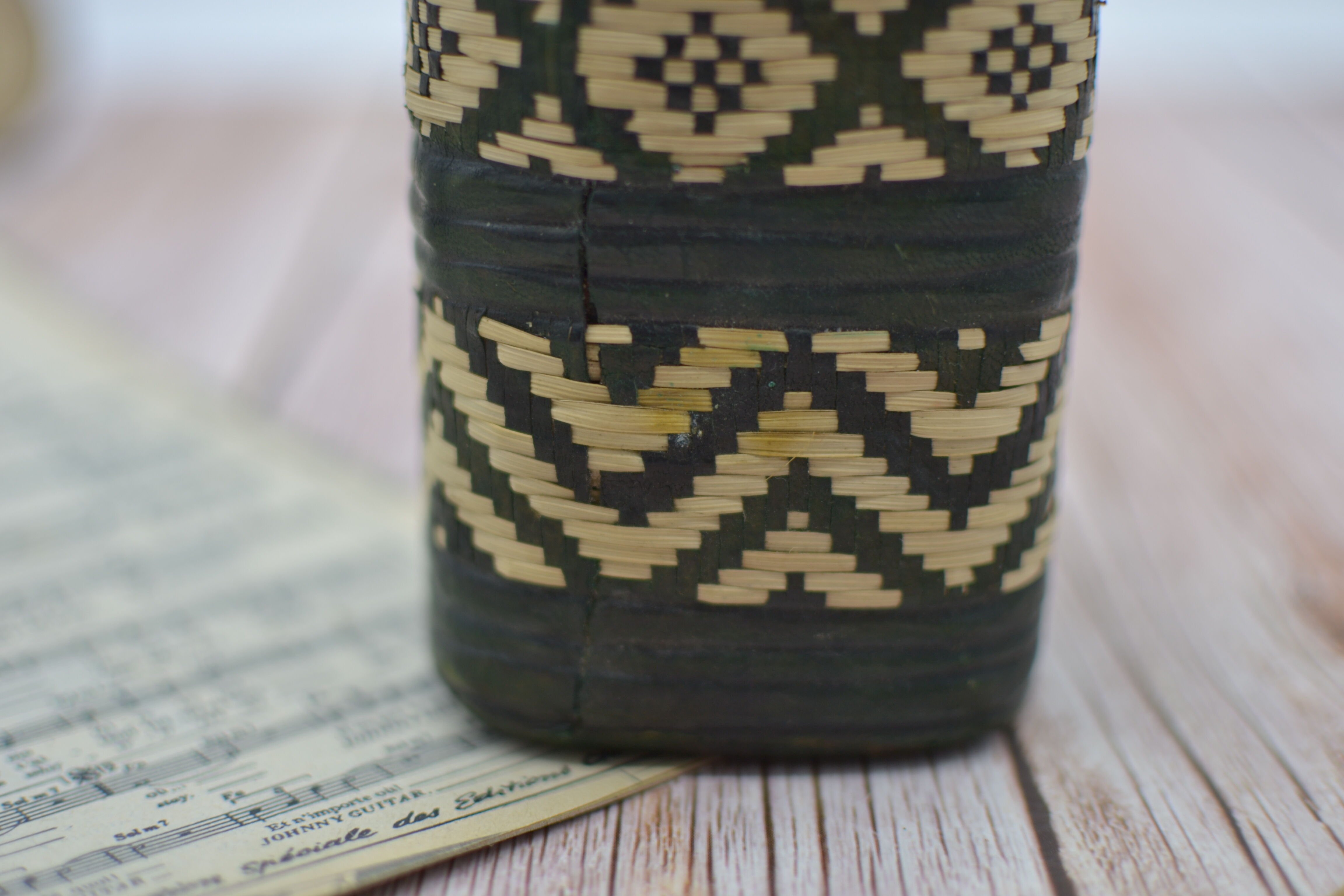 Set of 2 decorative vintage bottles covered with leather & wicker