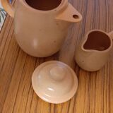 Coffee maker milk jar in sandstone