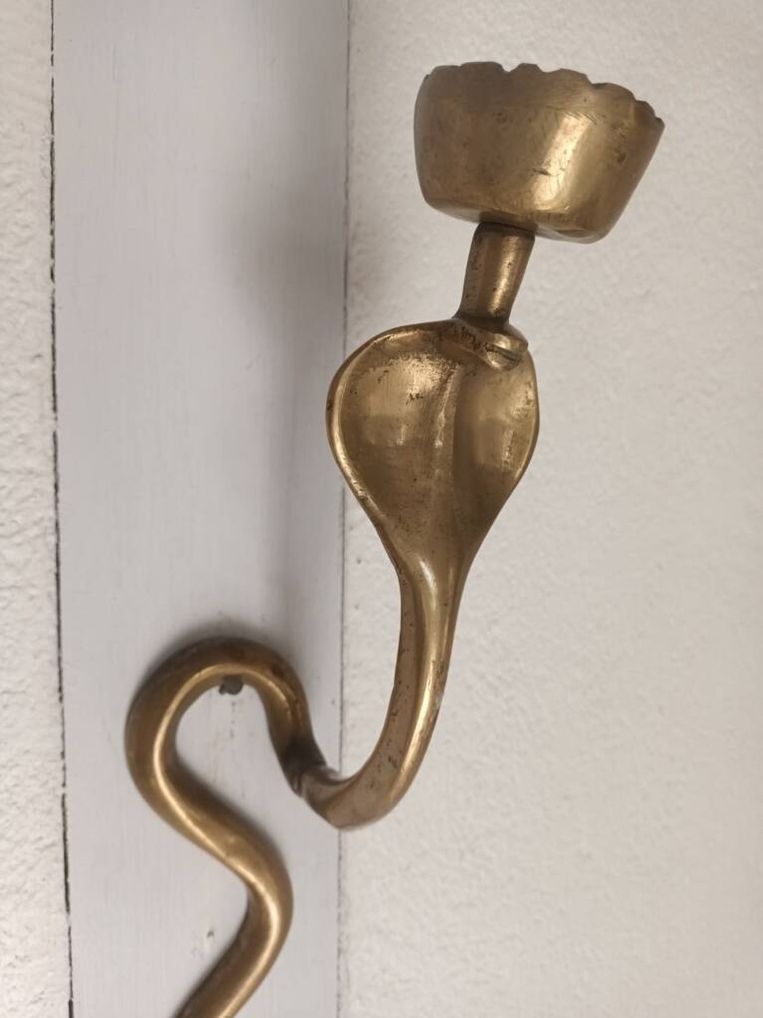 Bronze cobra candle holder wall sconce