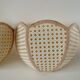 Pair of lotus cane wall lights from the 50s and 60s