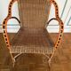 Vintage rattan armchair from the 60s-70s – Orange and black graphic trim - Sty