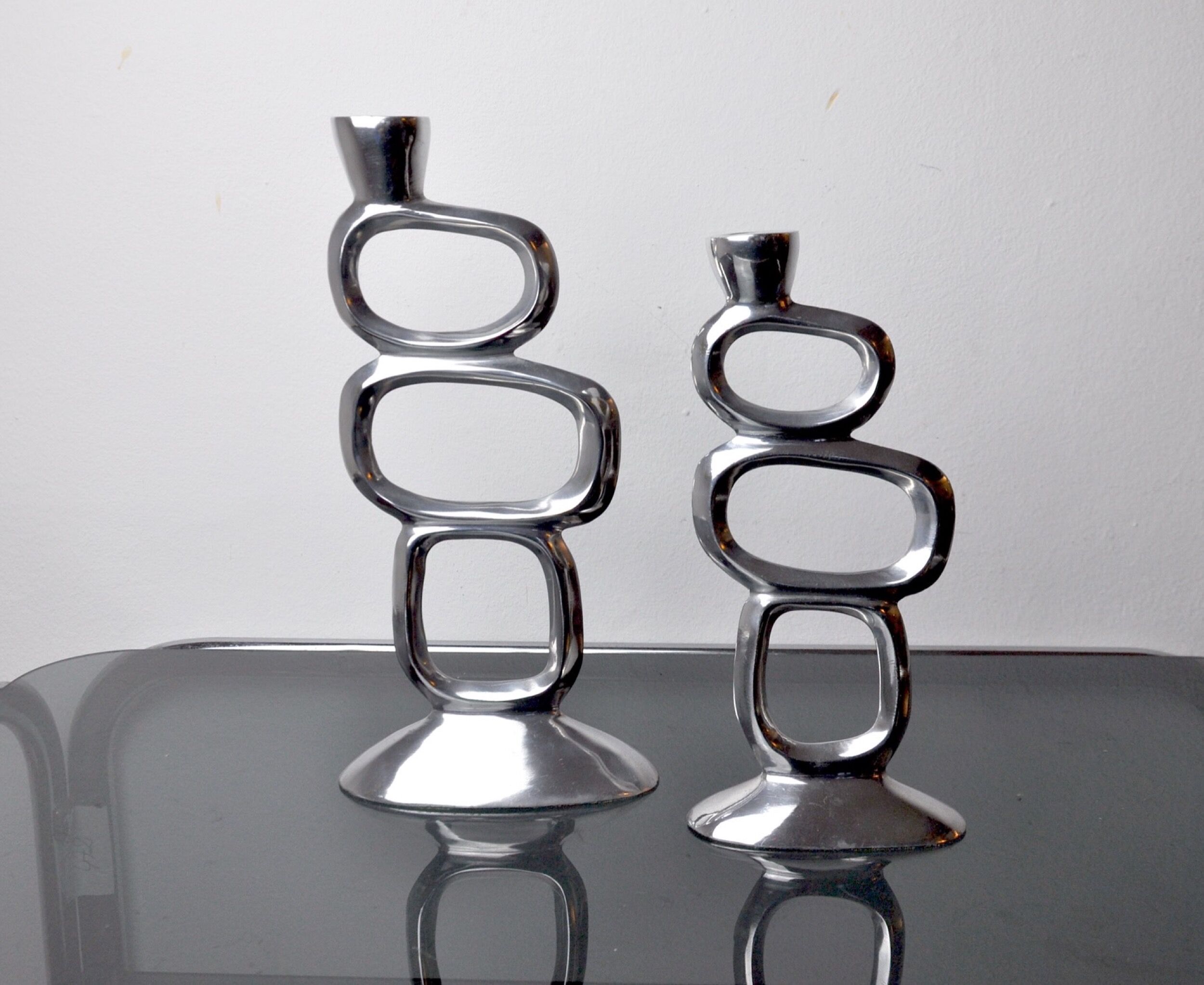 Pair of circle candlesticks by Matthew Hilton, England, 1980