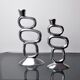 Pair of circle candlesticks by Matthew Hilton, England, 1980