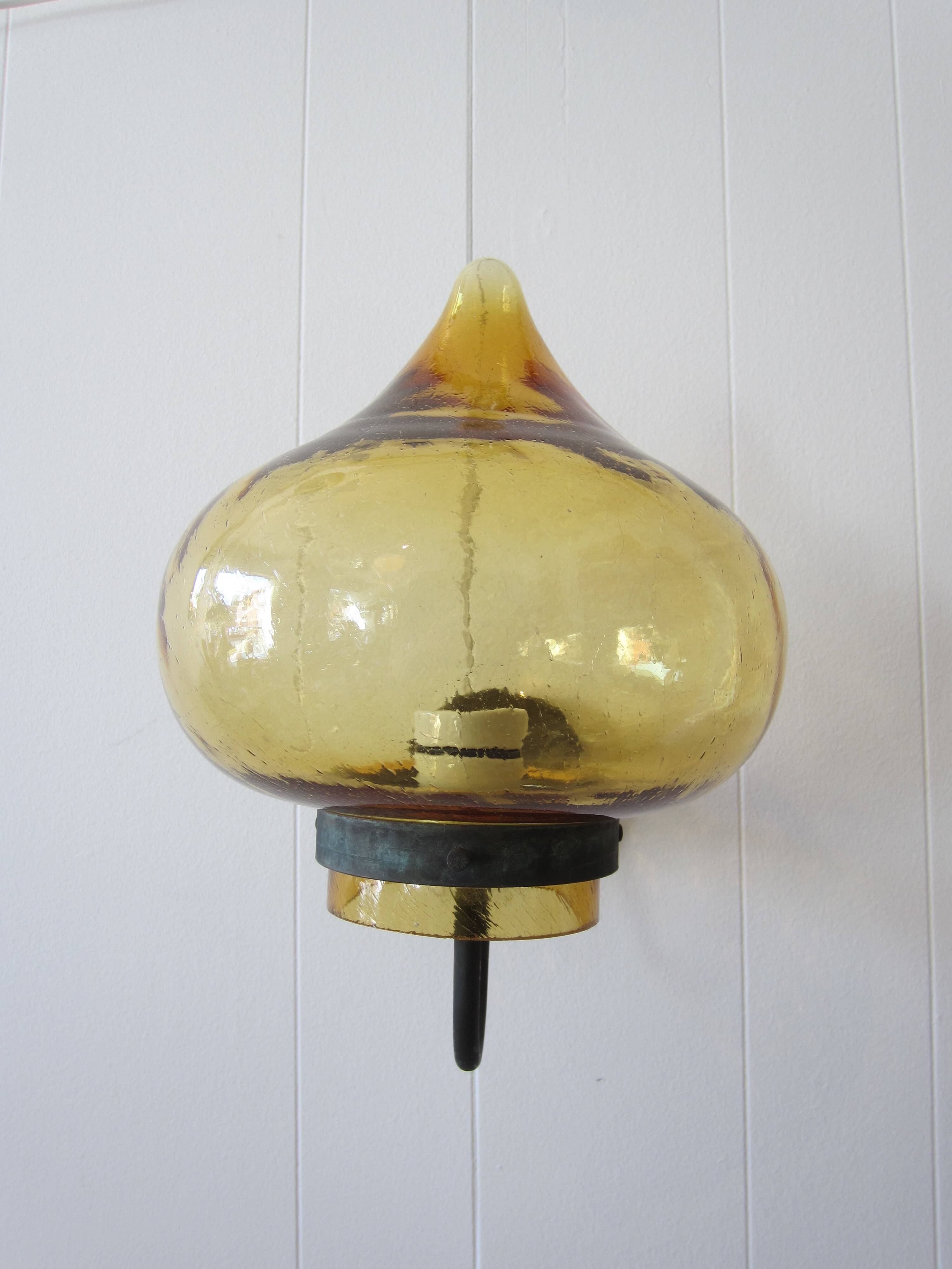Scandinavian outdoor wall light in copper and amber glass