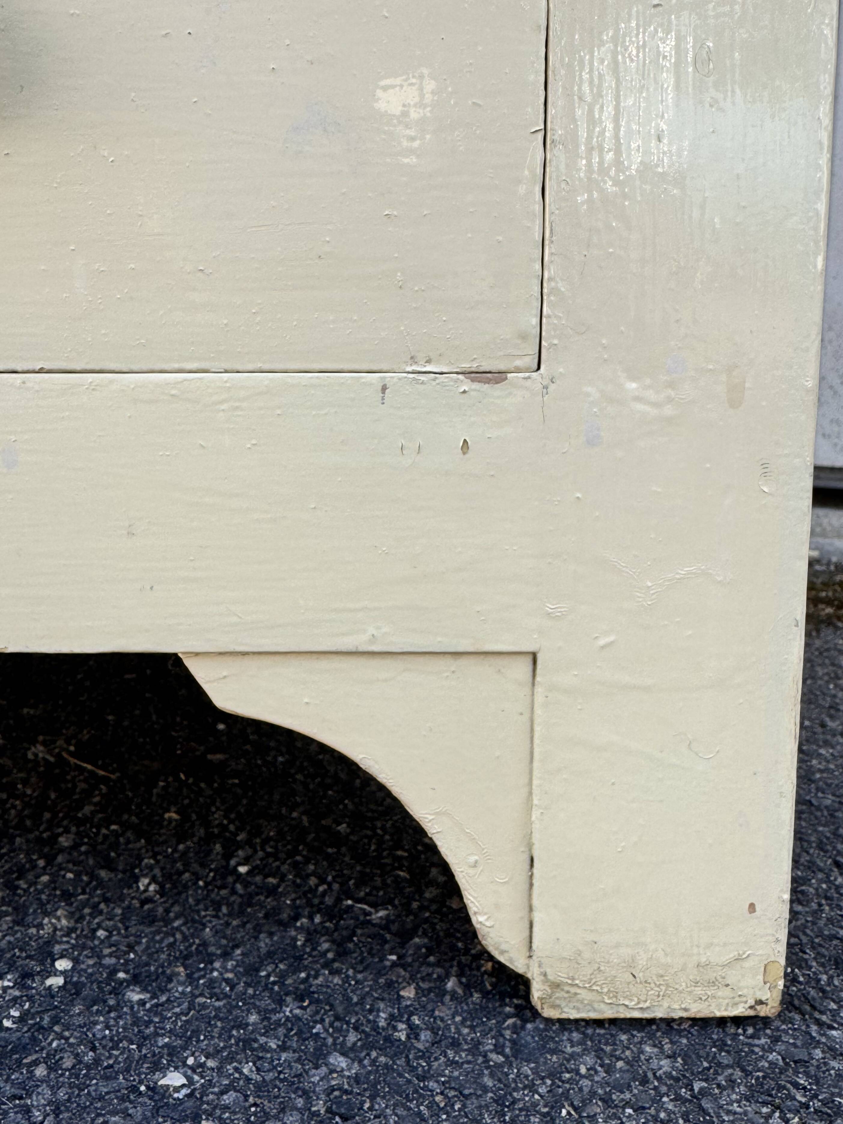 Antique painted wooden bonnet maker