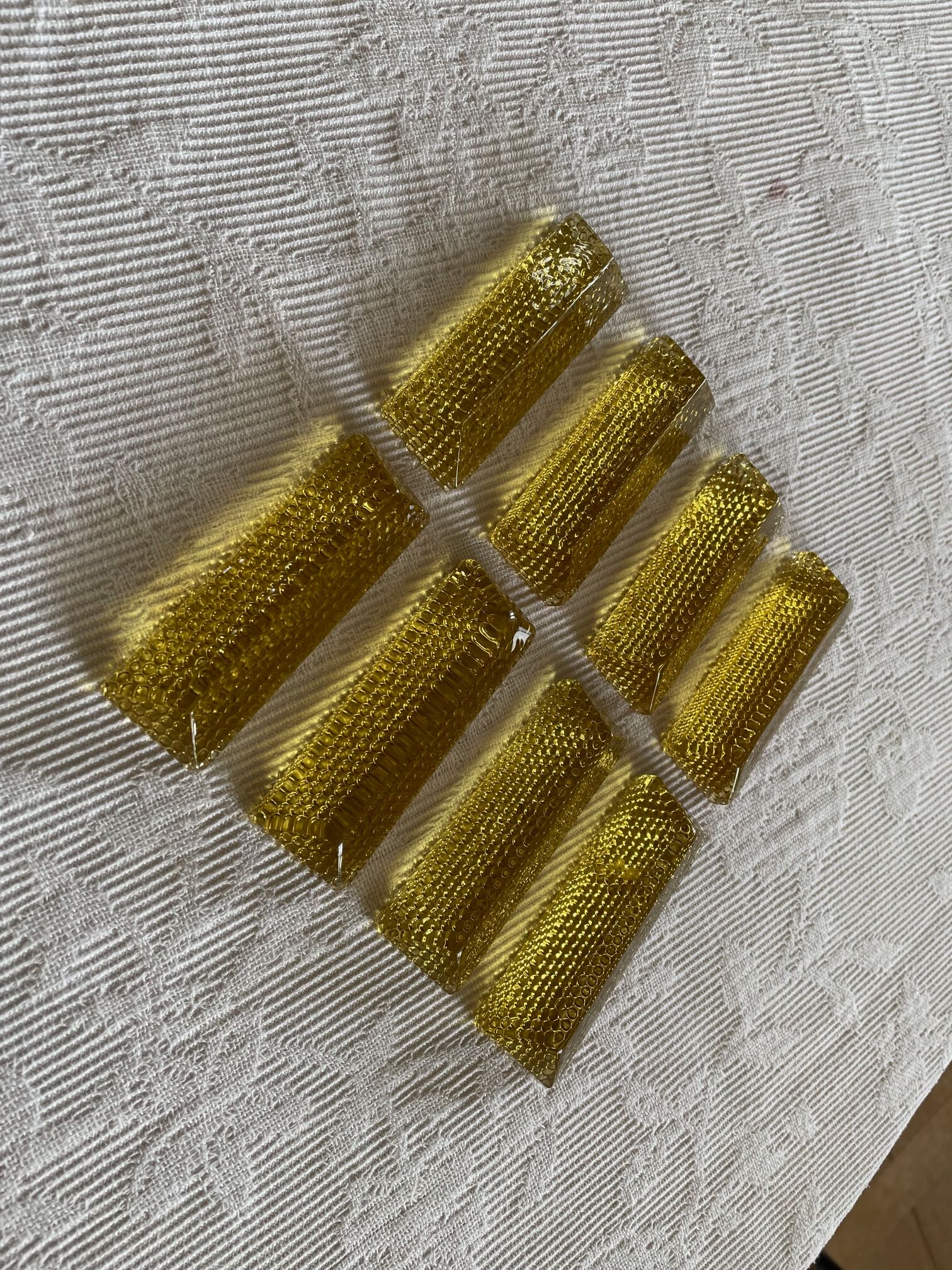 Set of tinted glass knife rests