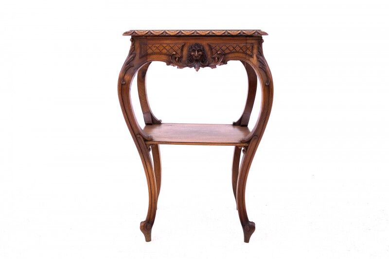Small table with delicate carving, France, circa 1890.