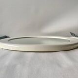 Vintage round white plastic mirror