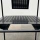 Postmodern black Quinta chair in perforated metal by Mario Botta for Alias, 1980s.