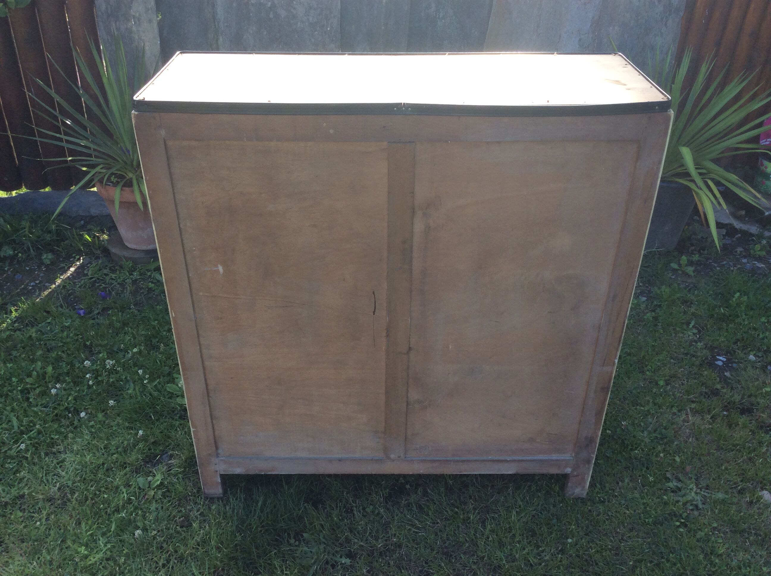 Parisian buffet painted in yellow with 2 doors and 2 drawers from an old Trailer.