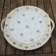 11 Limoges porcelain dessert plates, Raynaud & Co