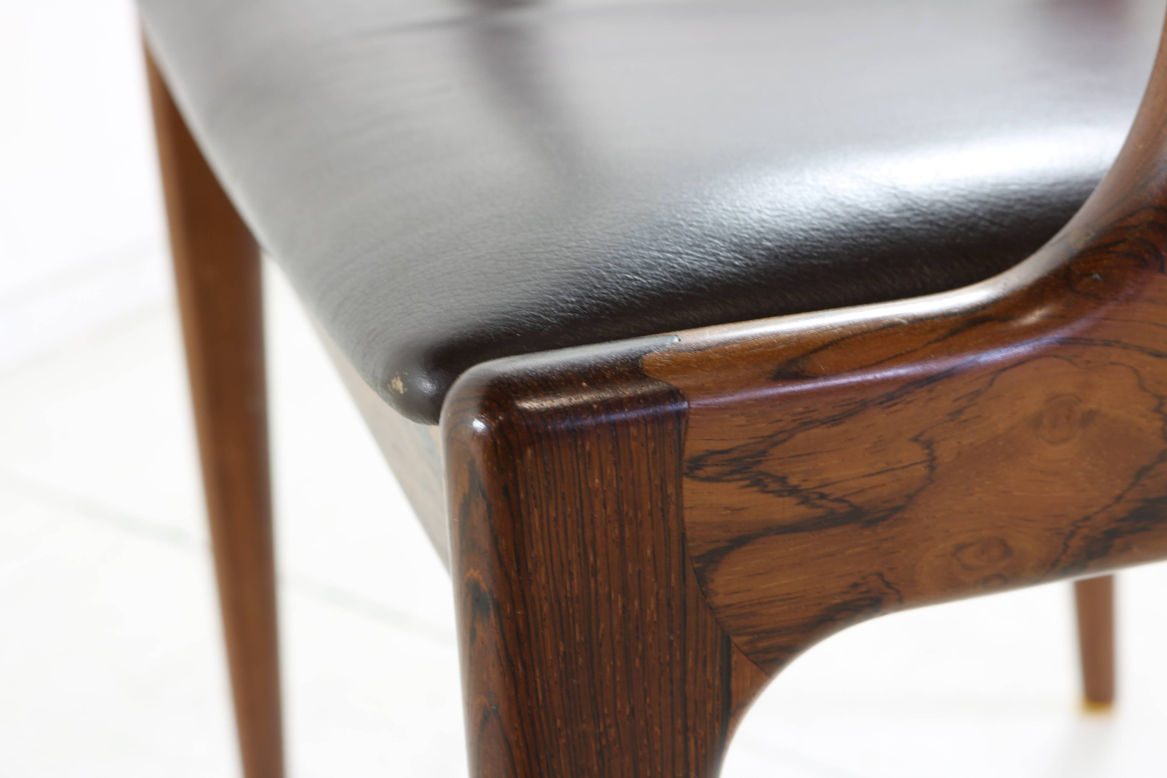 Grained rosewood danish design armchair by Johannes Andersen
