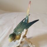 Polychrome porcelain parakeet figurine by Karl Ens.