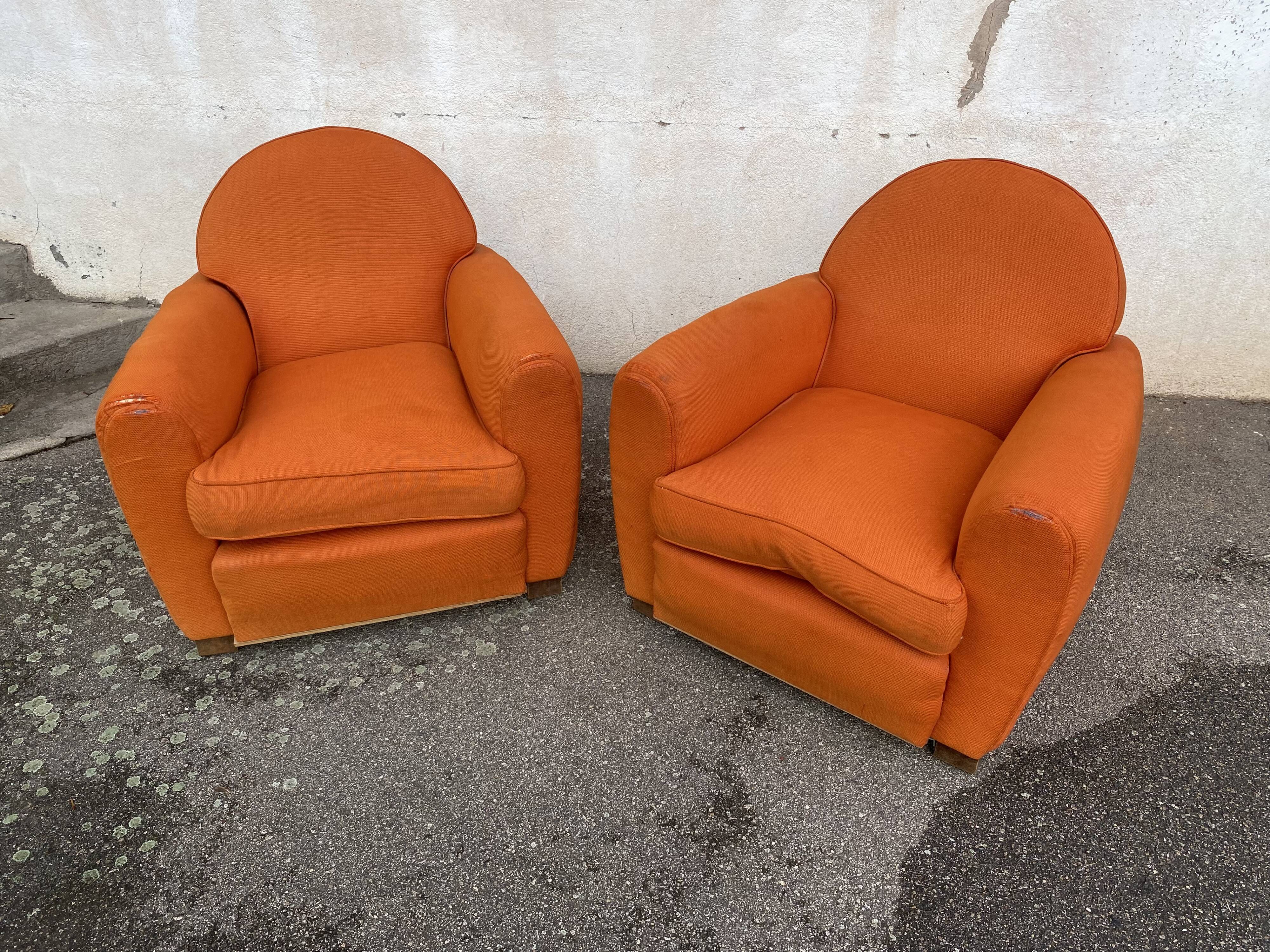 Pair of vintage orange club chairs