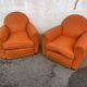 Pair of vintage orange club chairs