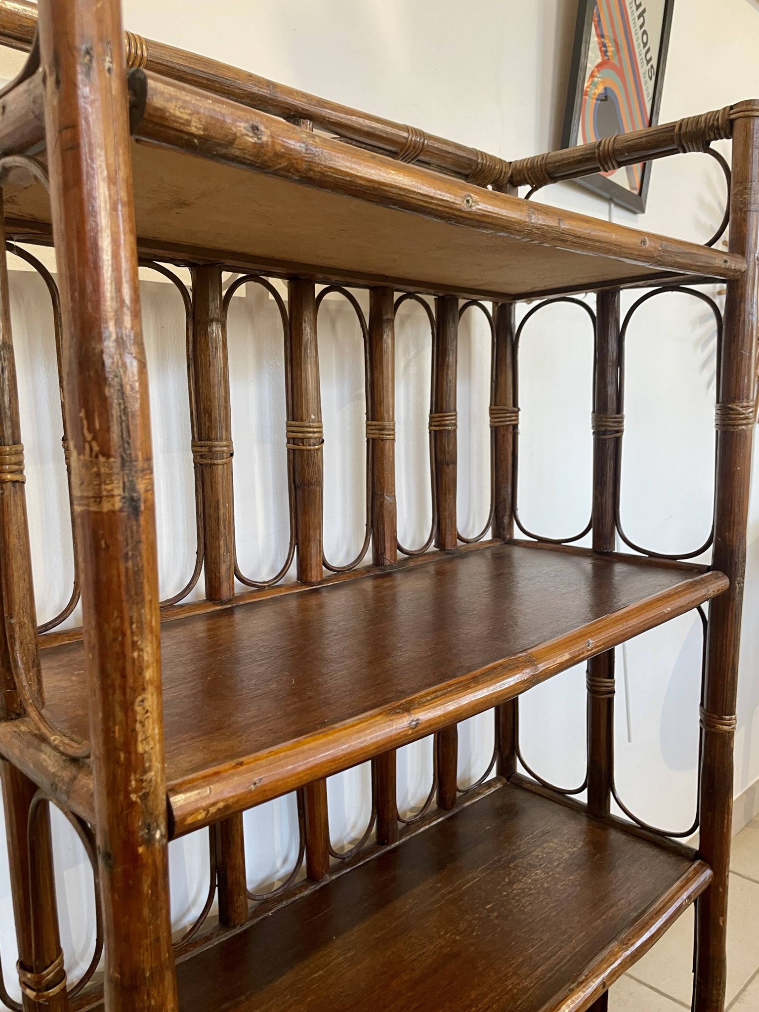 Shelf on rattan and bamboo legs from the 70s