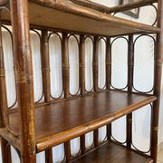 Shelf on rattan and bamboo legs from the 70s