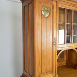Art Nouveau oak buffet and dinanderie panels, circa 1910