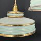 Set of 4 Art Deco pendant lights in frosted water green and gold.