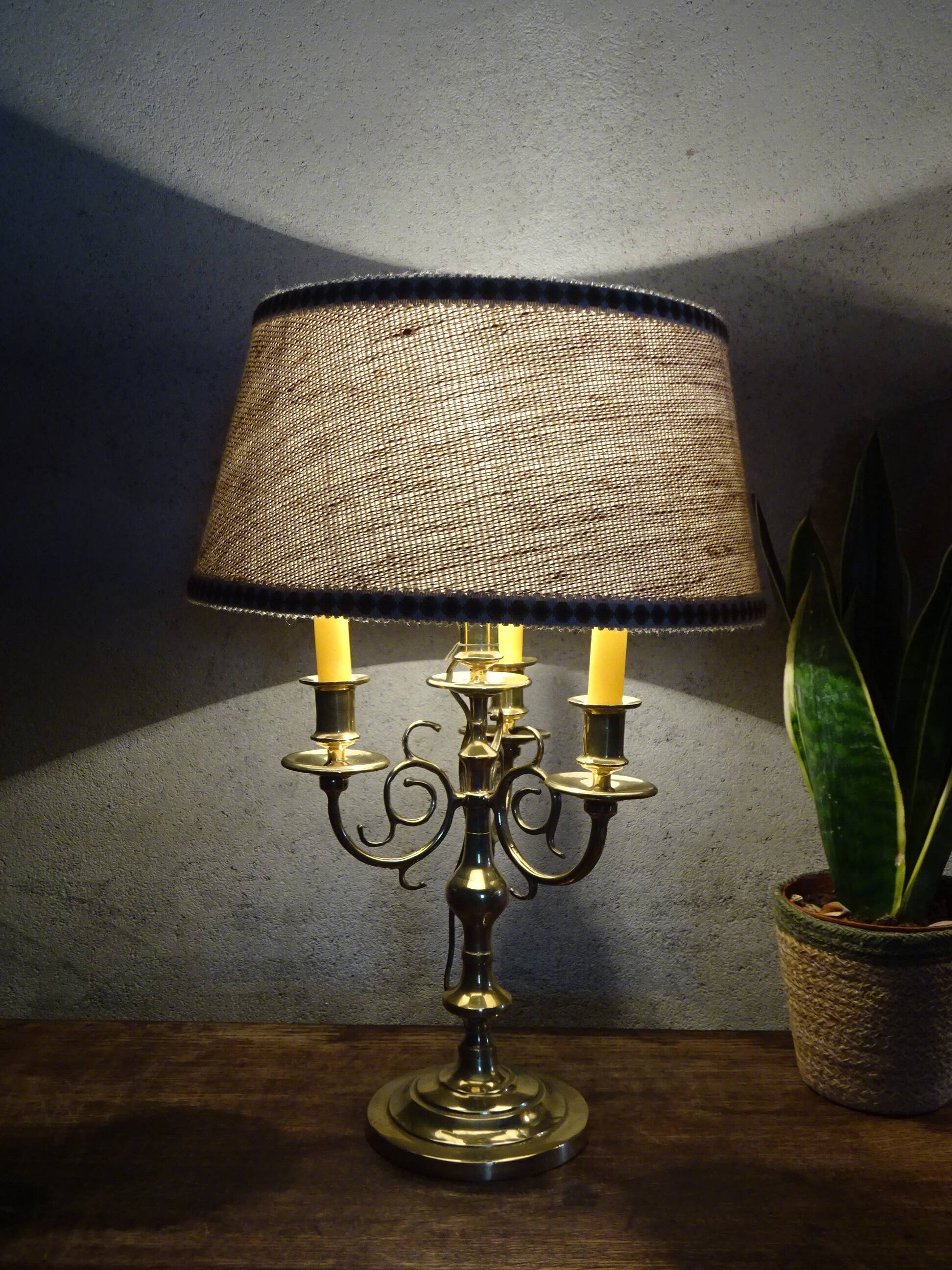Copper candlesticks adapted as bedside lamps, the pair.