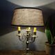 Copper candlesticks adapted as bedside lamps, the pair.