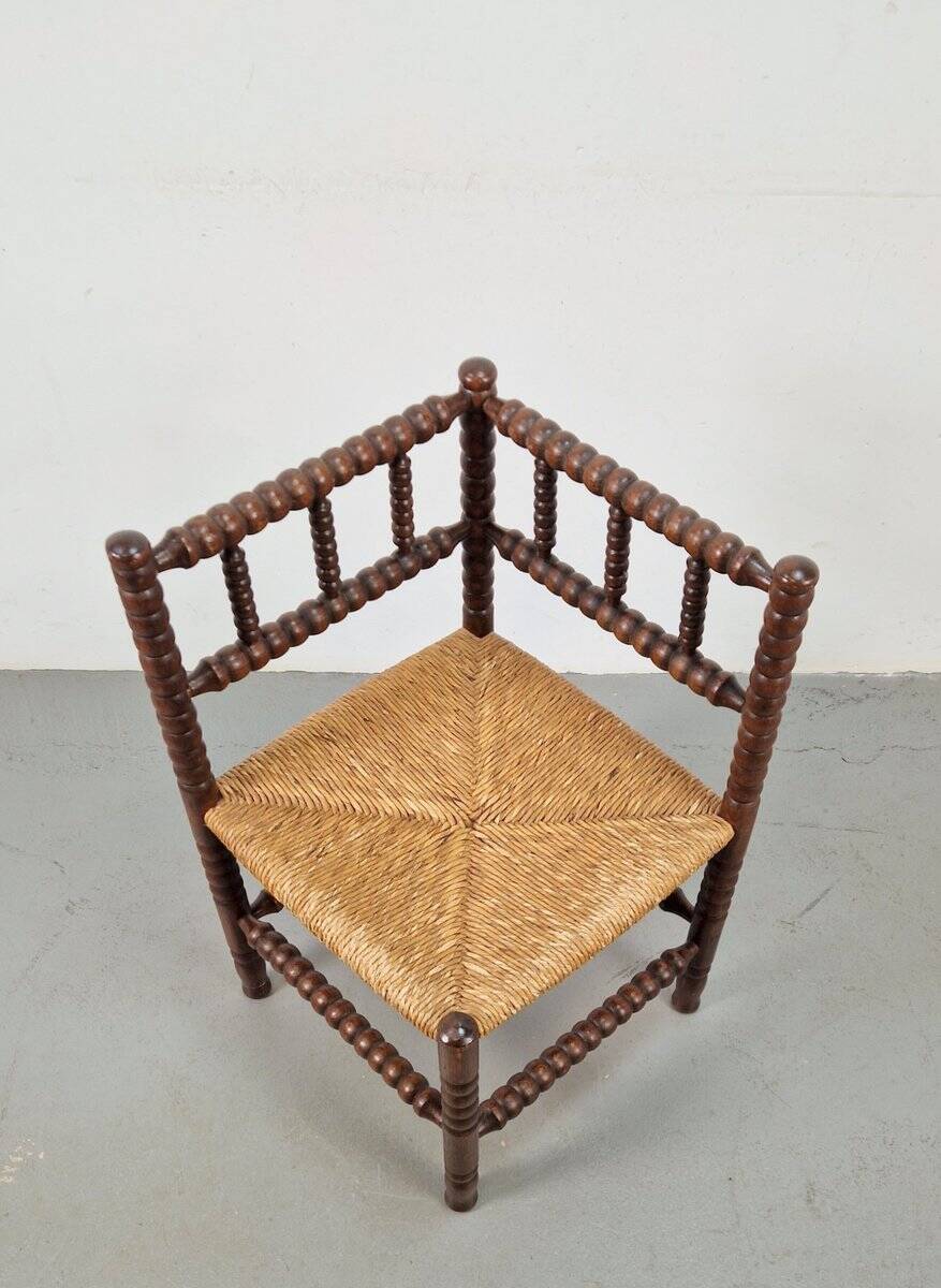 Corner chair in Arts and Crafts style made of oak with a rush seat, 1950s.