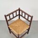 Corner chair in Arts and Crafts style made of oak with a rush seat, 1950s.