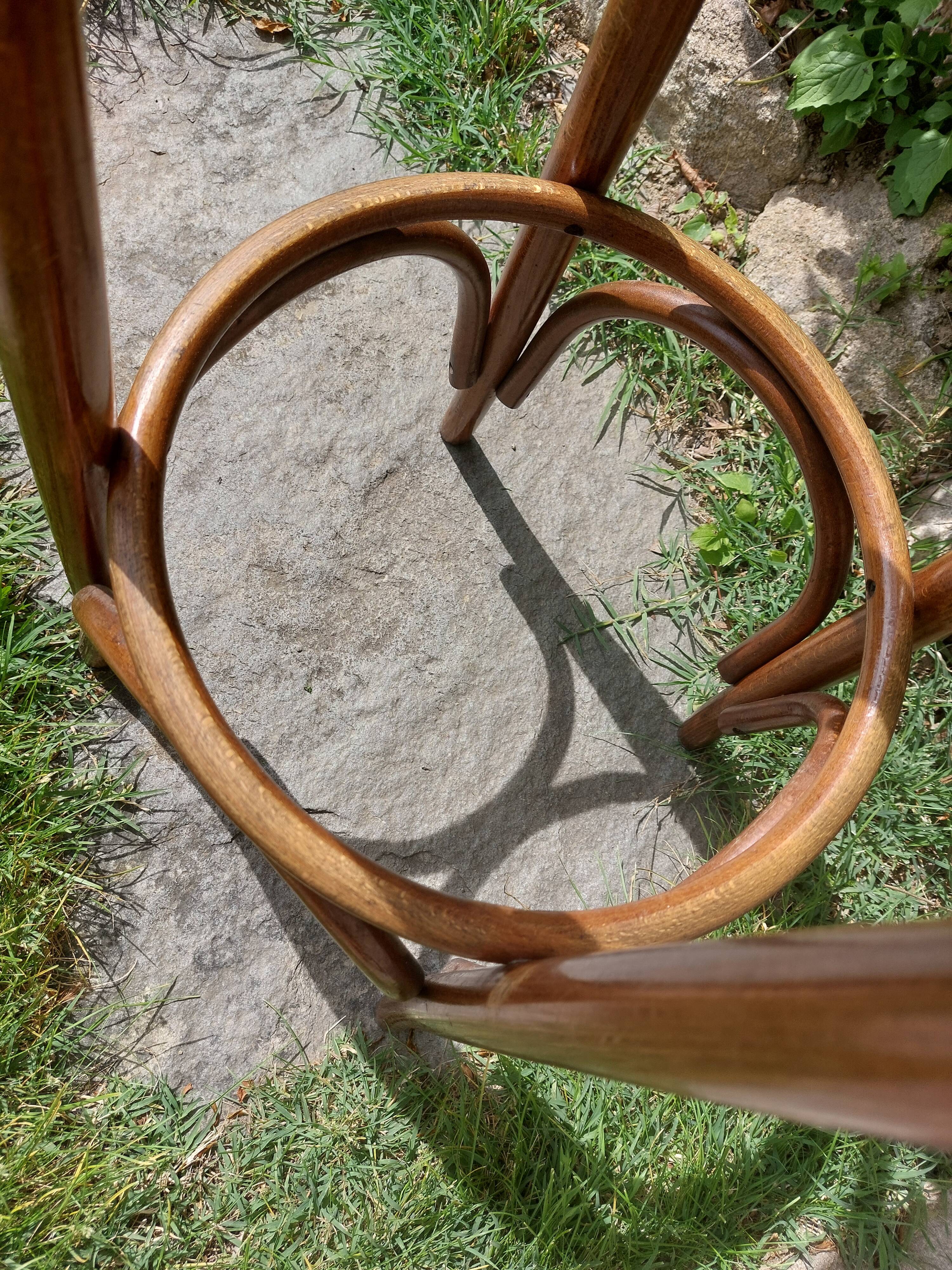 curved wooden bar stool