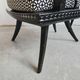 Pair of antique hand-carved armchairs in black lacquer from the 1920s.