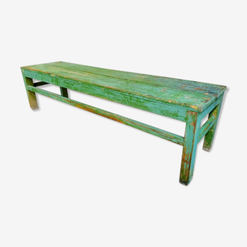 Old wooden bench sidetable green