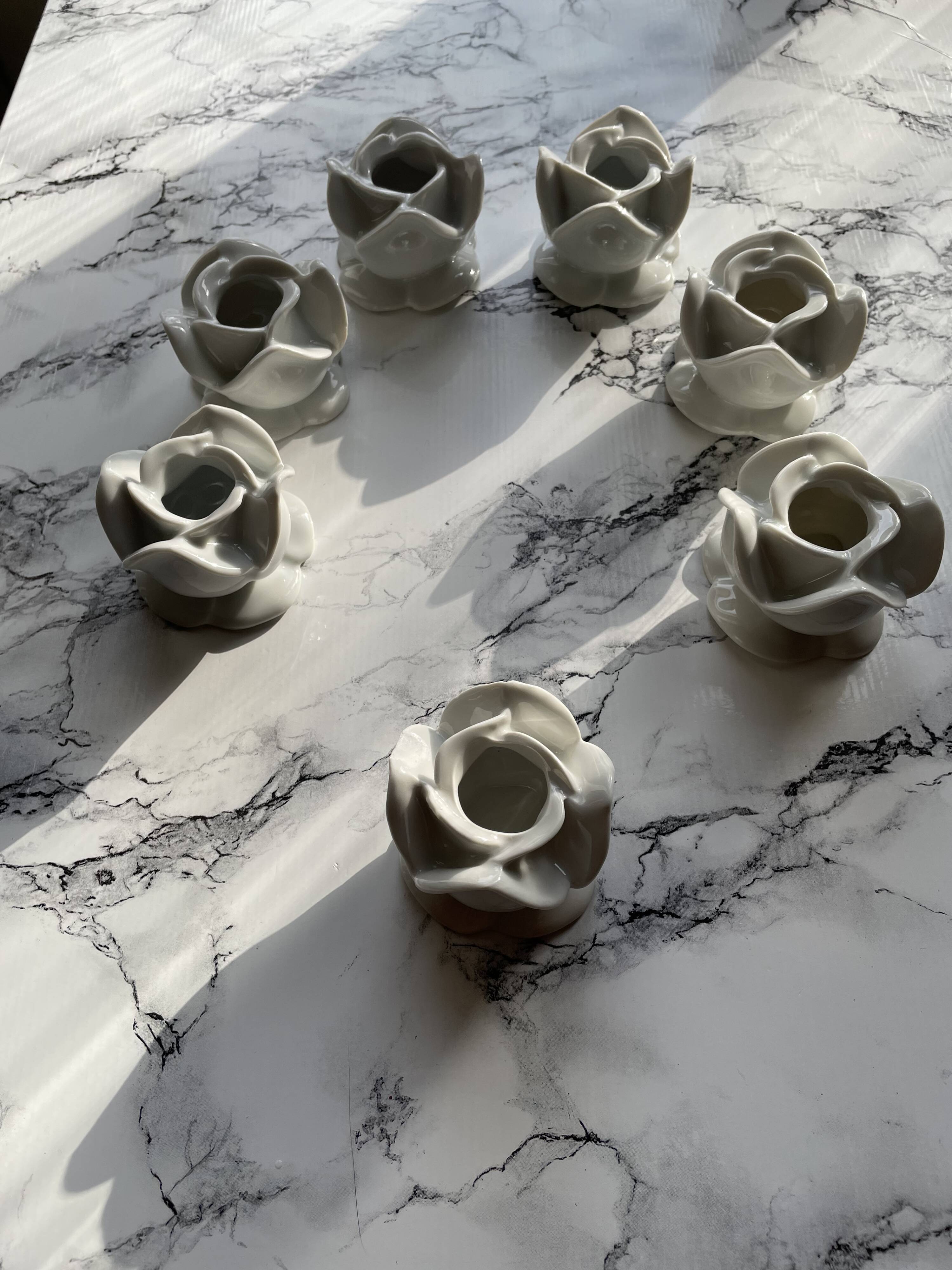 White porcelain rose shaped candle holders