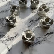 White porcelain rose shaped candle holders