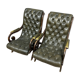 Pair of chesterfield armchairs in leather and stained wood circa 1940