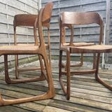 4 magnificent Baumann sled chairs, with caning.