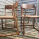 4 magnificent Baumann sled chairs, with caning.