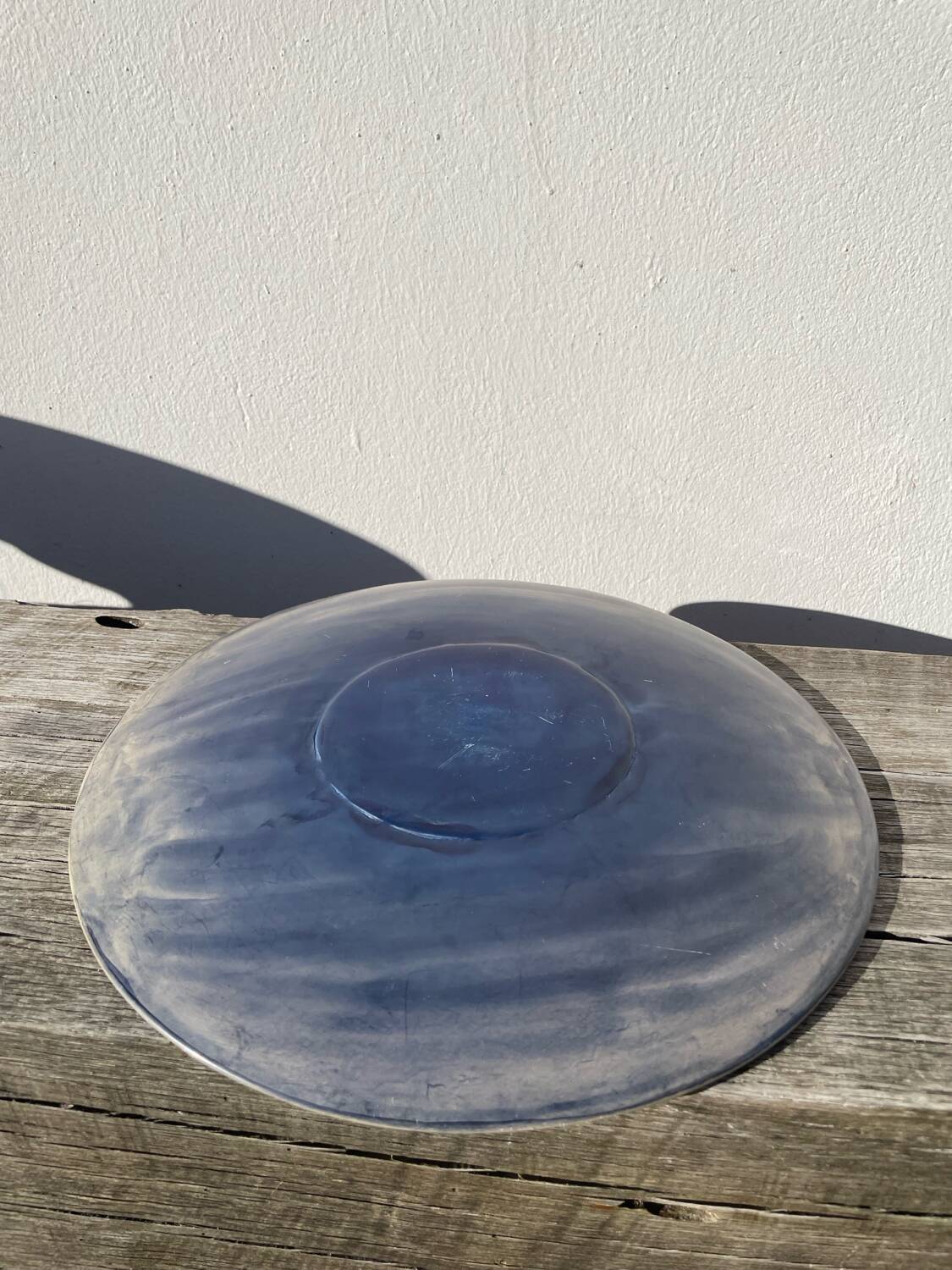 Ethnic handmade round fish dish