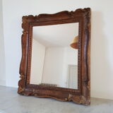 Carved wooden mirror