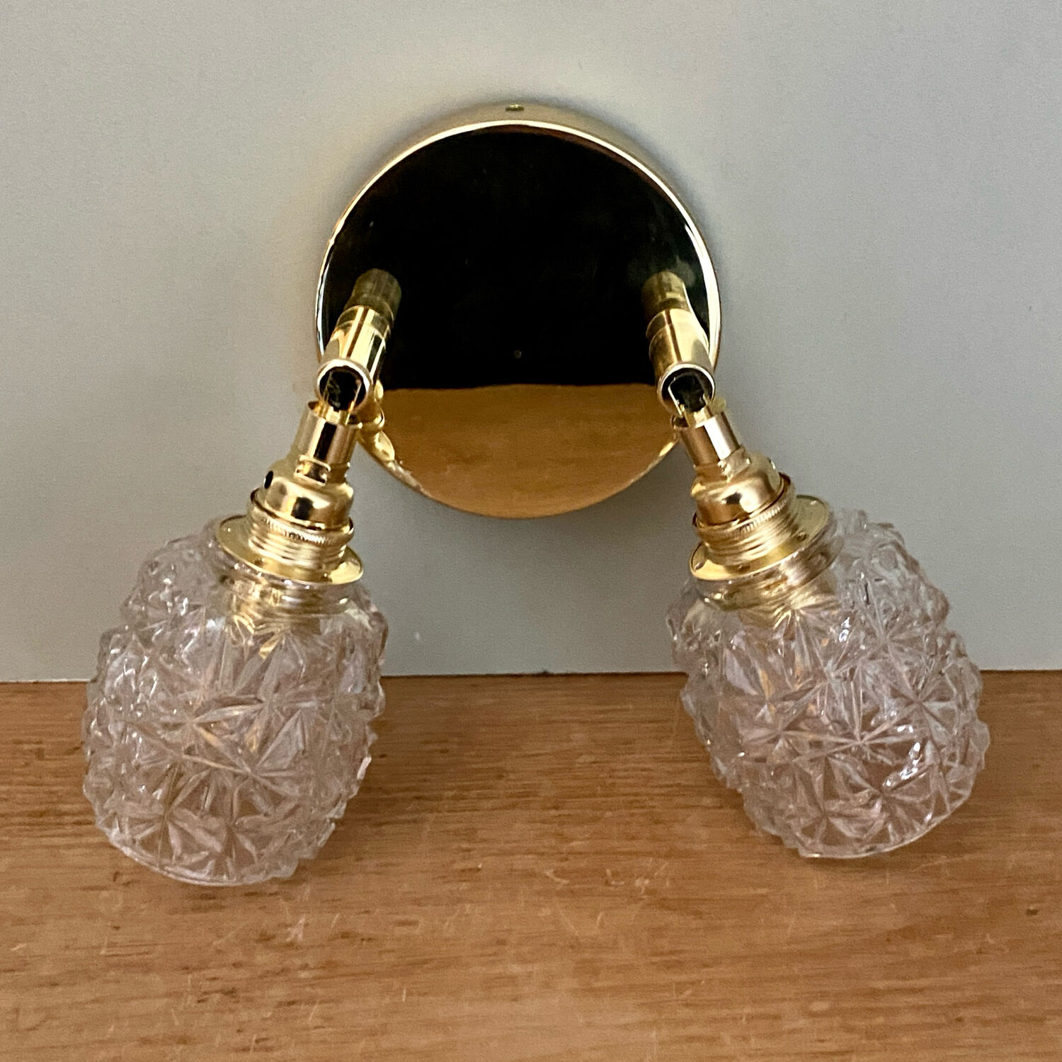 Double vintage tulip wall light in moulded glass.