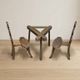 Vintage sculptural wooden table and two chairs, hand-carved loop backrests