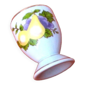 White porcelain egg cup decorated with pears / grapes.