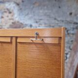 Triple curtain binder cabinet