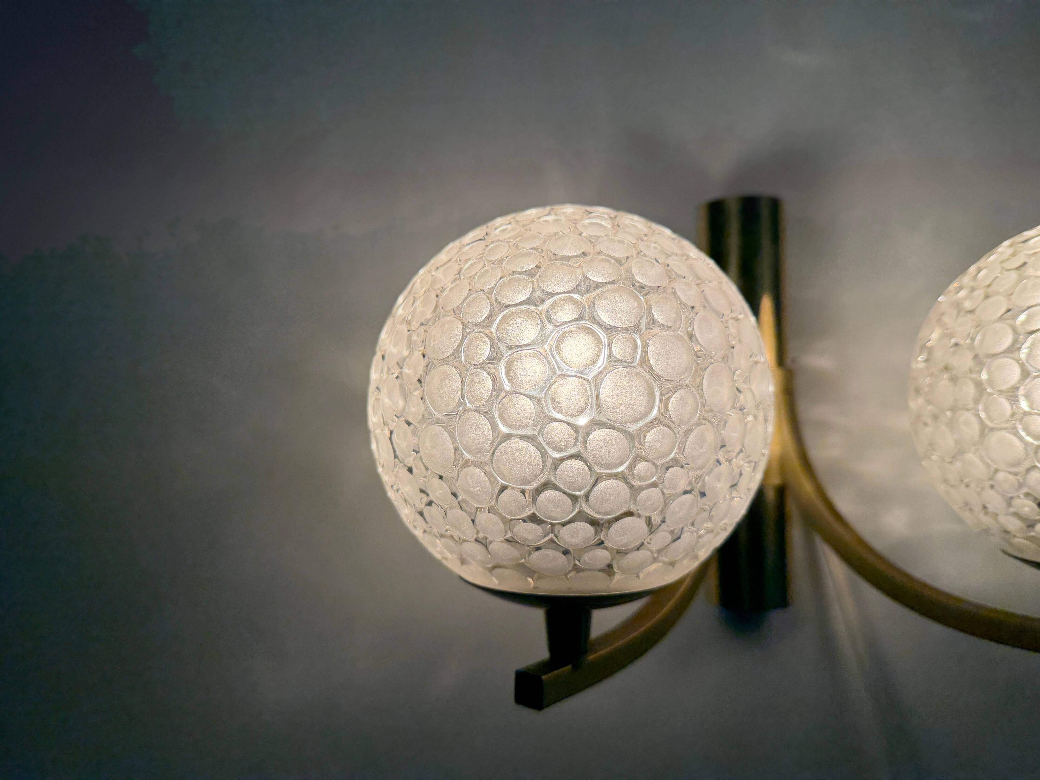 Simple two-armed wall light in brass and glass by Ball and Ball, Kaiser, 1960s, Germany.