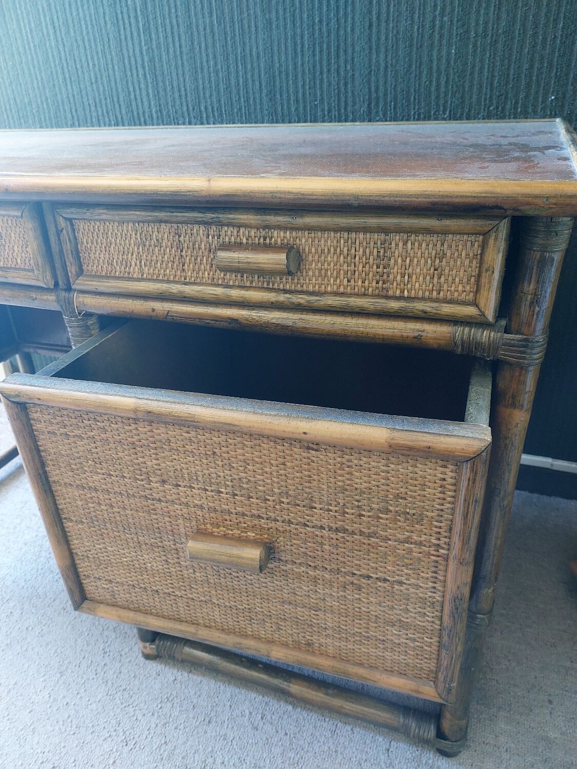 Many libraries and rattan desks.