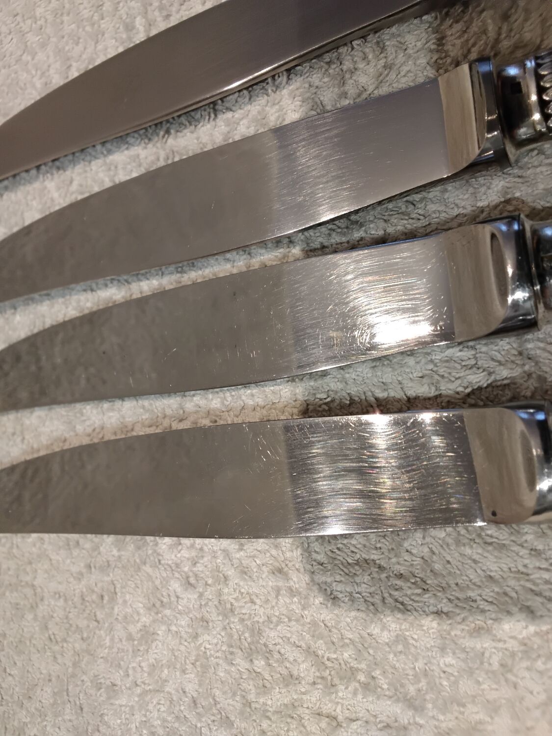 4 table knives with silver-plated metal handles, silversmith Christofle Malmaison