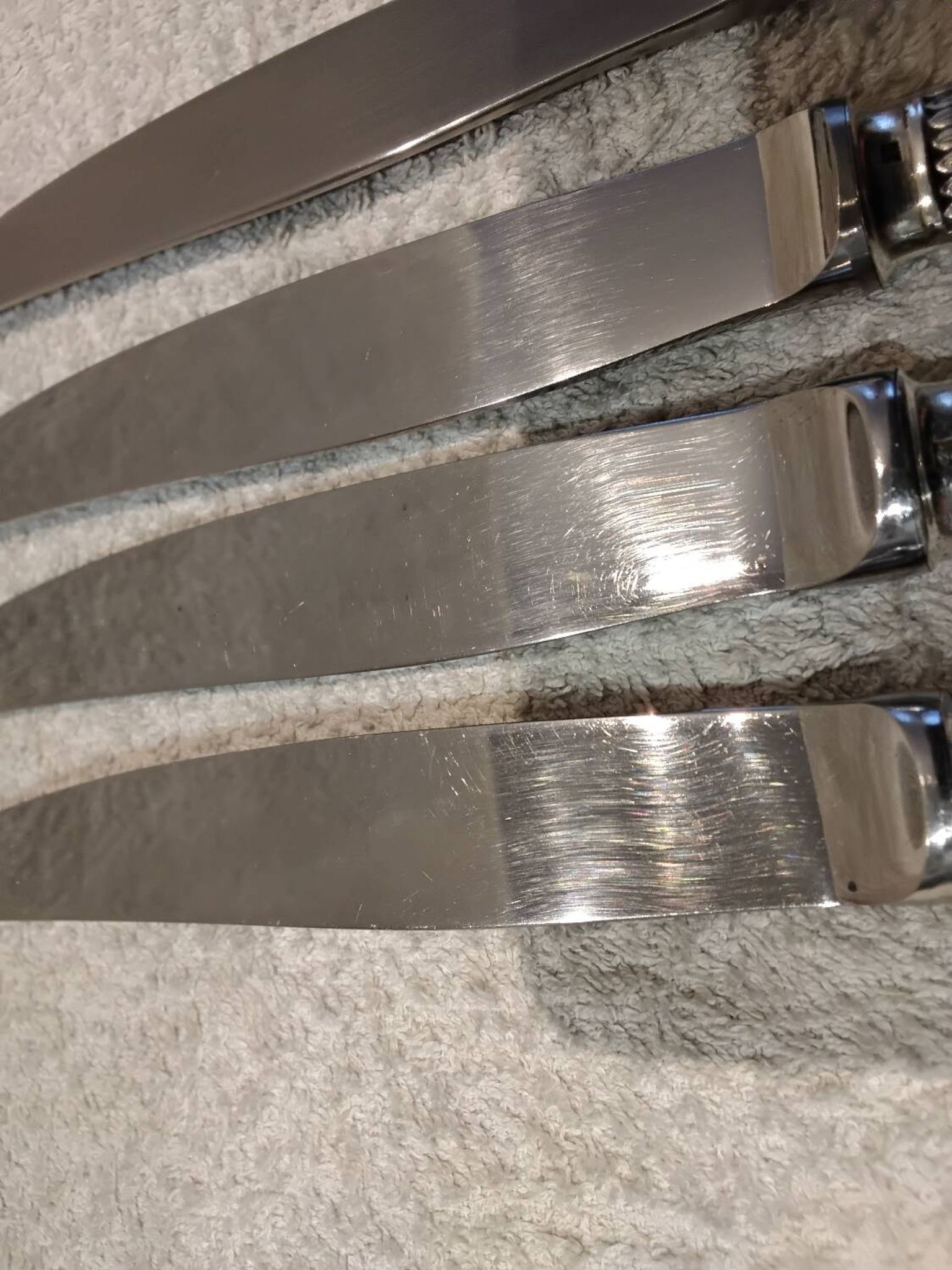 4 table knives with silver-plated metal handles, silversmith Christofle Malmaison
